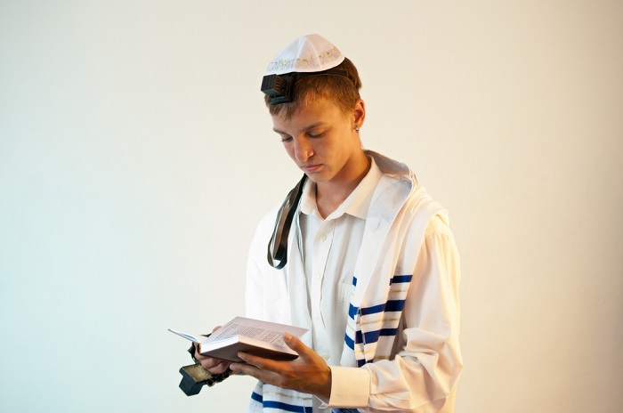 Young Jewish Man Does Prayers .